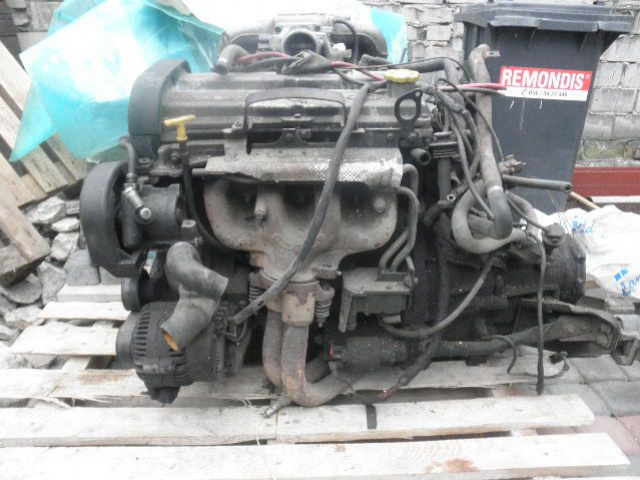Двигатель i коробка передач Ford Escort 1.8 EFI 97г.