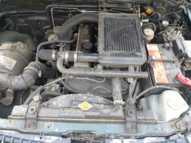 Mitsubishi Pajero L200 - двигатель 2, 5 4D56 w машине