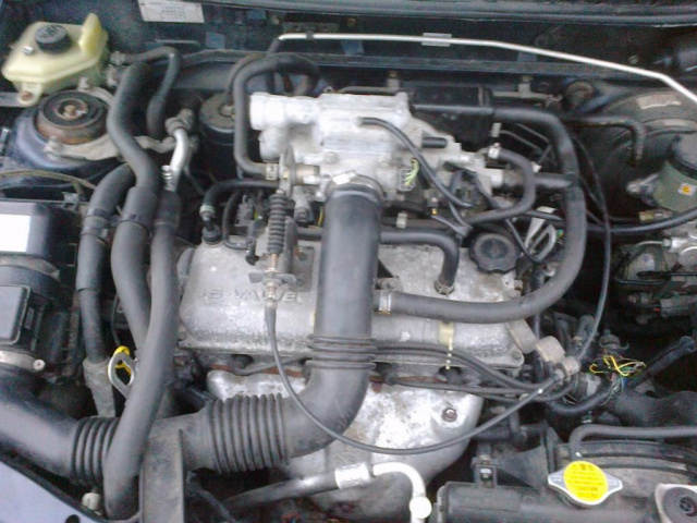 Mazda Demio двигатель 1.3 99г.