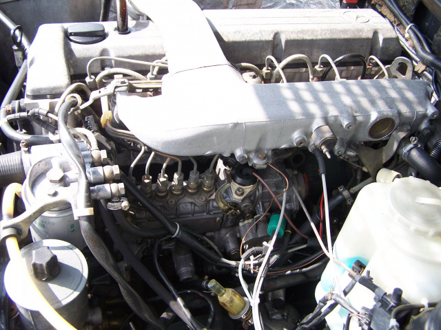 Двигатель Mercedes W124 3.0 TD w машине