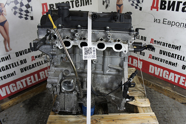 Двигатель вид с боку KIA G4LA