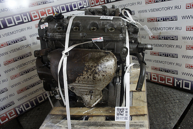 Двигатель вид с боку SUZUKI G16B 