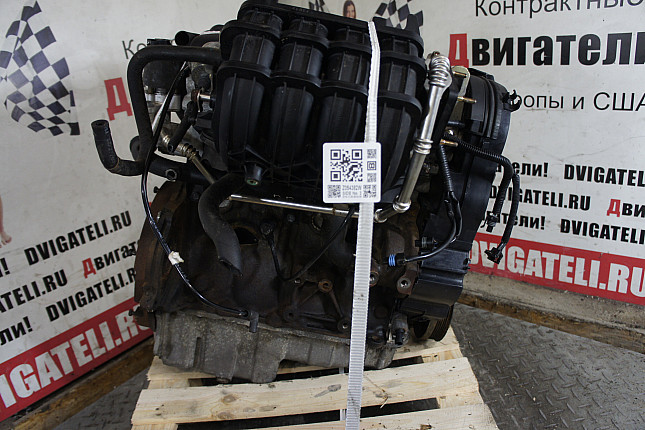 Двигатель вид с боку Chevrolet F14D3