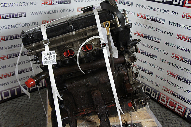 Двигатель вид с боку HYUNDAI G4CP-D