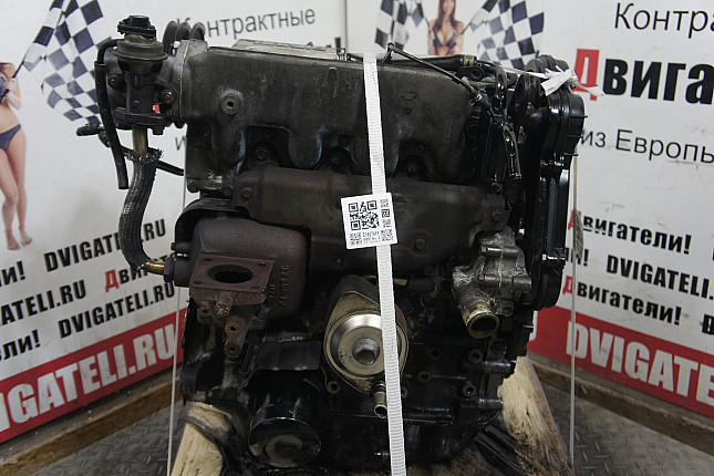 Двигатель вид с боку Mazda RF OHC