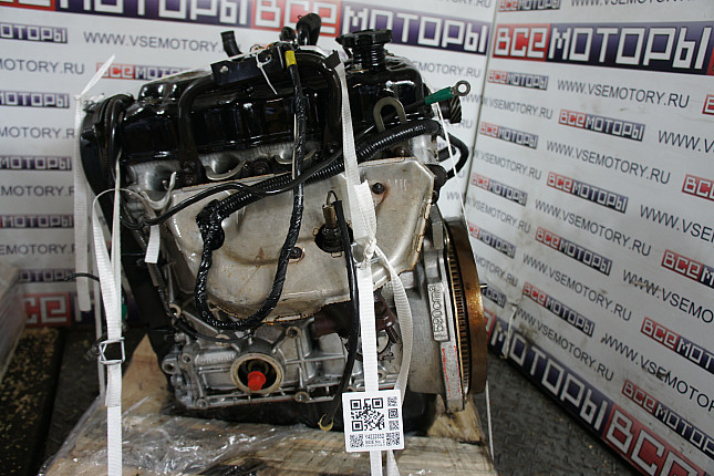 Двигатель вид с боку SUZUKI G16A