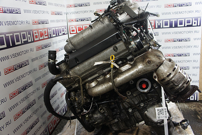 Двигатель вид с боку SUZUKI H 25 A
