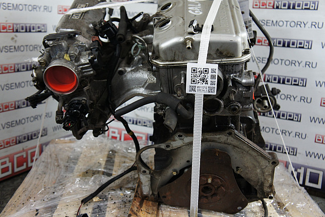 Двигатель вид с боку Mitsubishi 4G63 