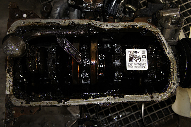 Фотография блока двигателя без поддона (коленвала) Ford KA24-E