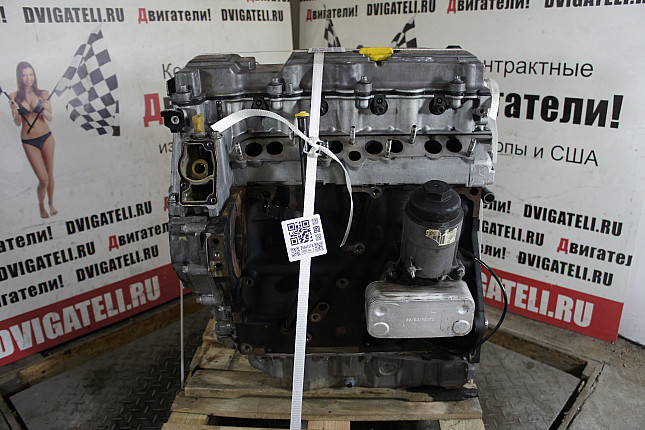 Двигатель вид с боку Opel X 20 DTL