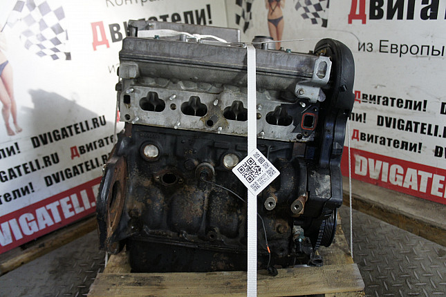 Двигатель вид с боку Opel X 14 XE