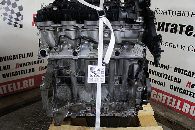 Двигатель вид с боку Suzuki 8HY