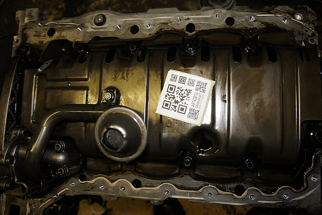 Фотография блока двигателя без поддона (коленвала) VW AXD