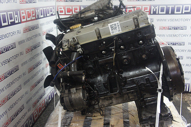 Двигатель вид с боку OPEL C 24 NE