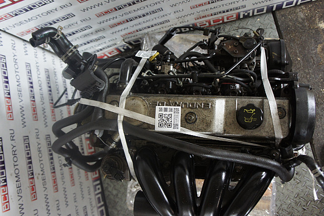 Фотография контрактного двигателя сверху FORD RTJ