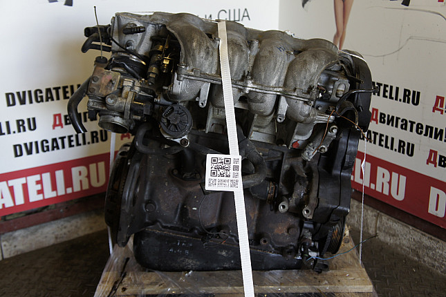 Двигатель вид с боку Opel X 14 XE