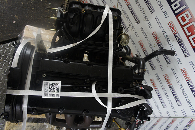 Фотография контрактного двигателя сверху CHEVROLET F14D3