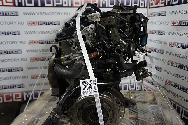 Двигатель вид с боку Suzuki G16B 