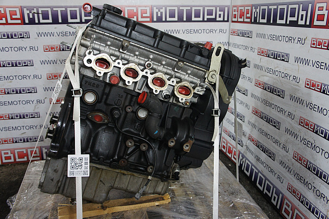 Двигатель вид с боку CHEVROLET A16DMS