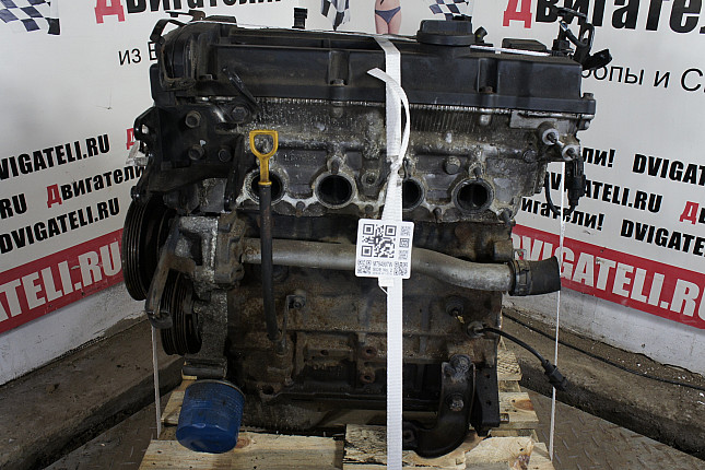 Двигатель вид с боку Hyundai G4ED-G